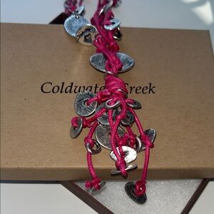 Coldwater Creek pink cord necklace with silver-toned metal accents, includes box